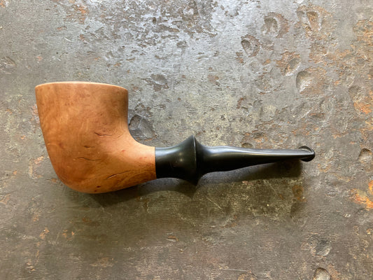 Briar pipe, “the nose warmer”