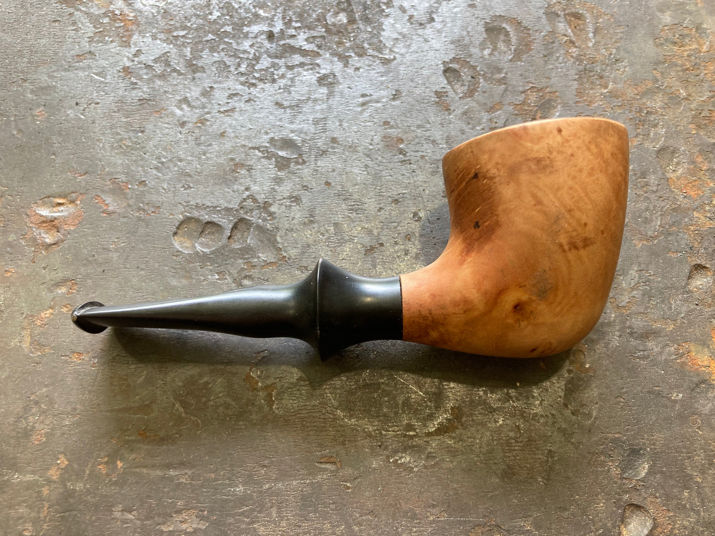 Briar pipe, “the nose warmer”