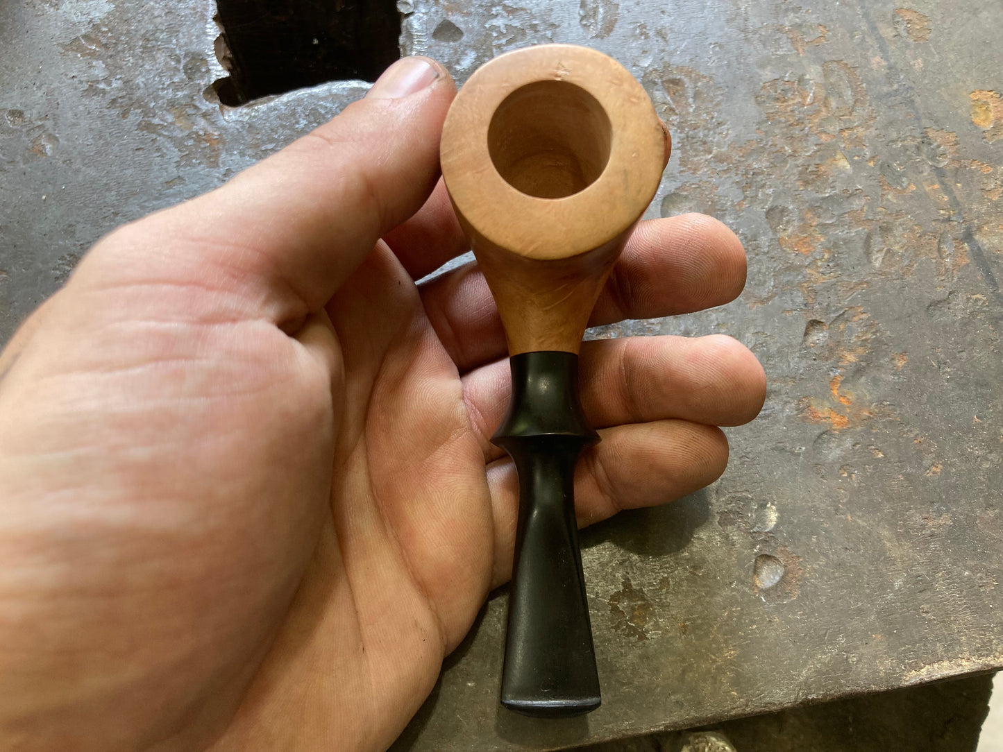 Briar pipe, “the nose warmer”