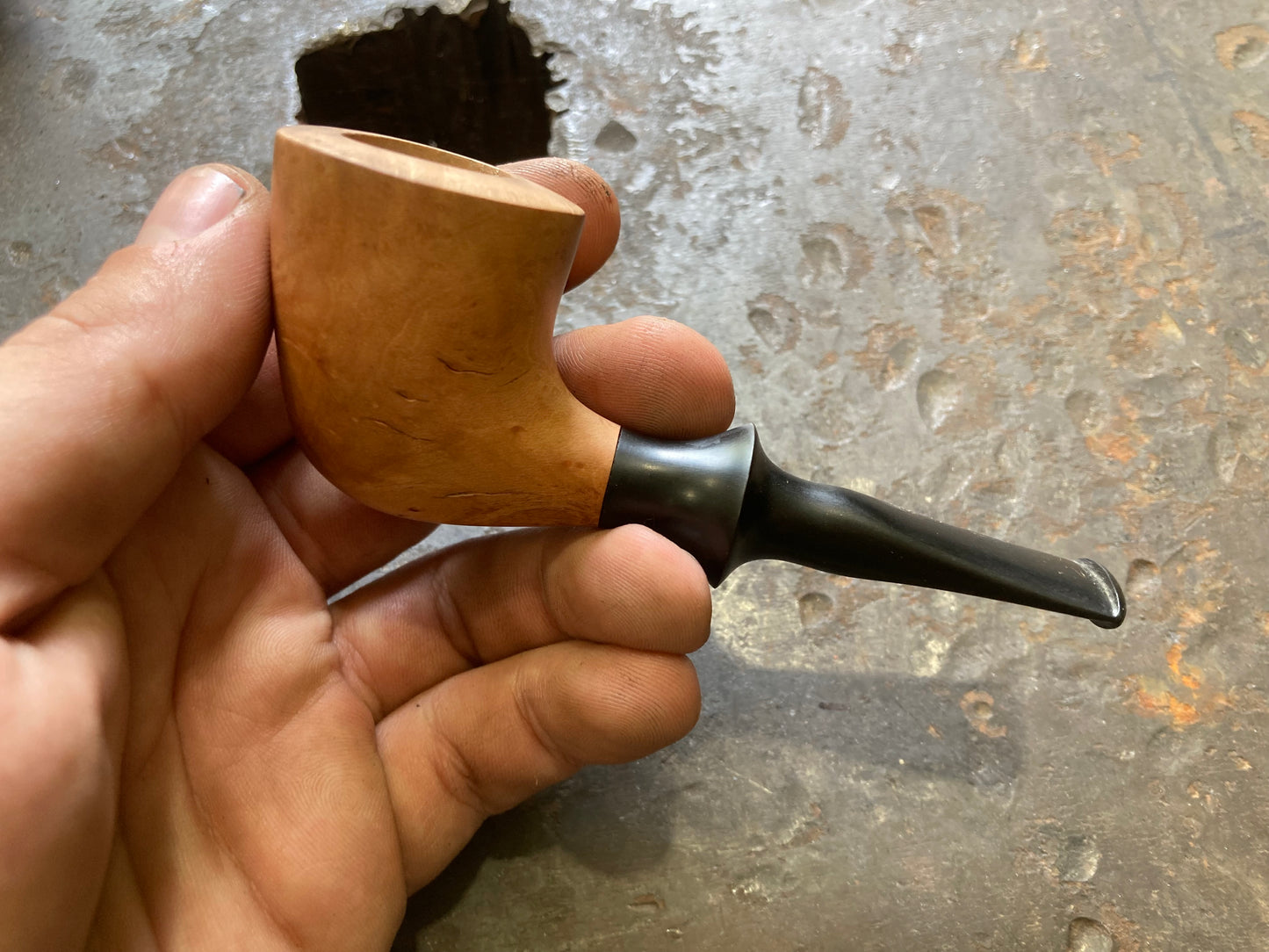 Briar pipe, “the nose warmer”